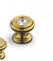 Bouton doré et strass Bouton doré et strass