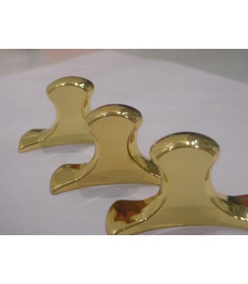 Poignée bouton boomerang